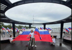 Велопробег с триколором: амурские налоговики в День флага проехали на велосипедах по набережной
